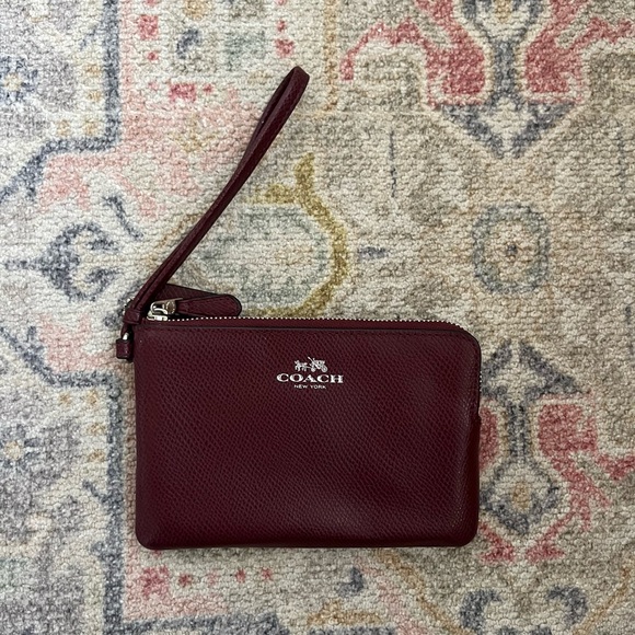 Coach Handbags - Coach wristlet. Burgundy